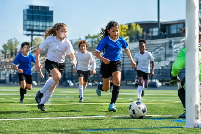 Youth players using a synthetic turf field after Facility Upgrades